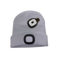 FARO: Sombrero con luz frontal LED recargable. Gris claro.