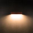 800-lumen solar-powered LED wall light with motion detector. White.