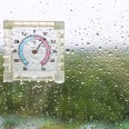 Self-adhesive indoor/outdoor window thermometer